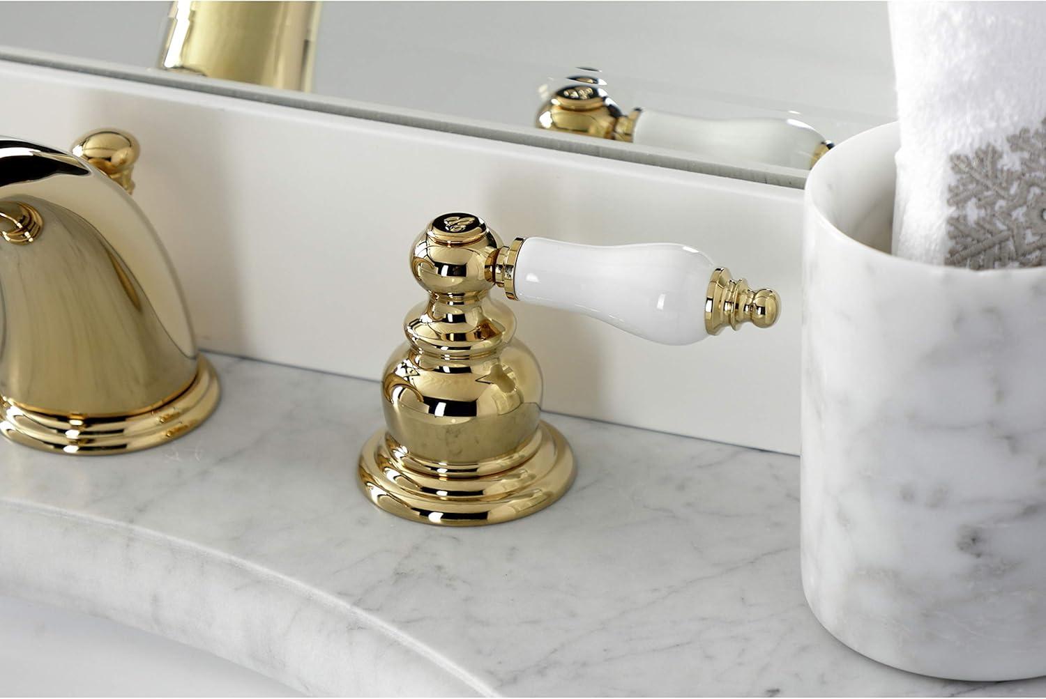 Kingston Brass Victorian Two-Handle 3-Hole Deck Mount Widespread Bathroom Faucet with Brass Pop-Up Drain