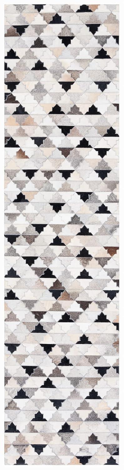 Loon Peak® Brentnal Flat Weave Hair On Leather Geometric Rug