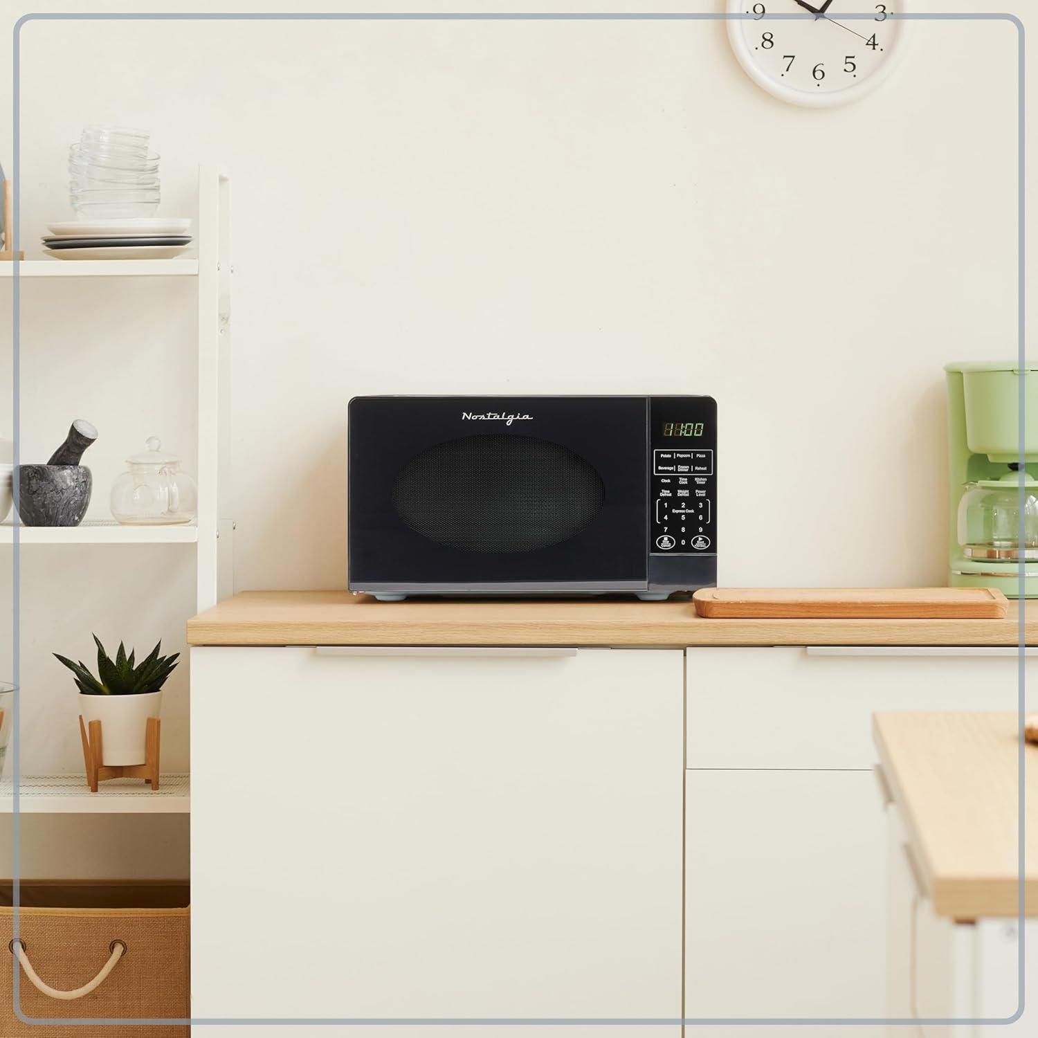 Nostalgia 0.7 Cubic Feet Countertop Microwave