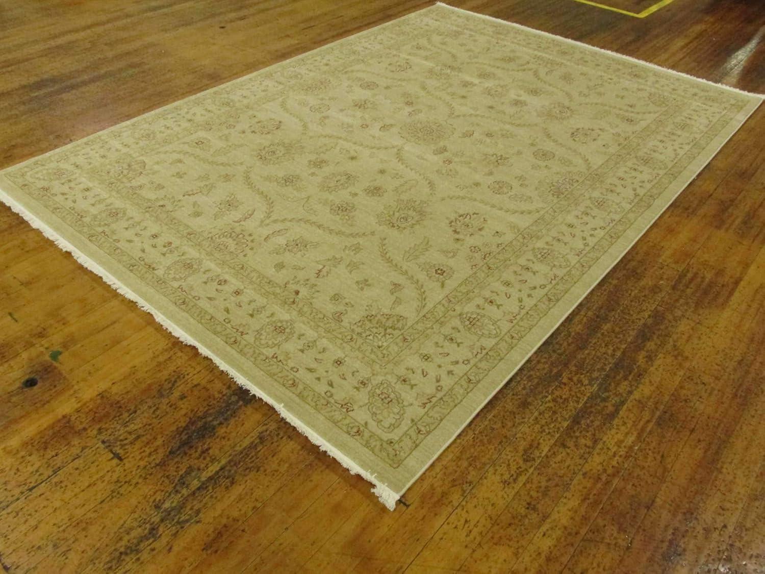 Cream and Beige 9' x 12' Synthetic Traditional Area Rug