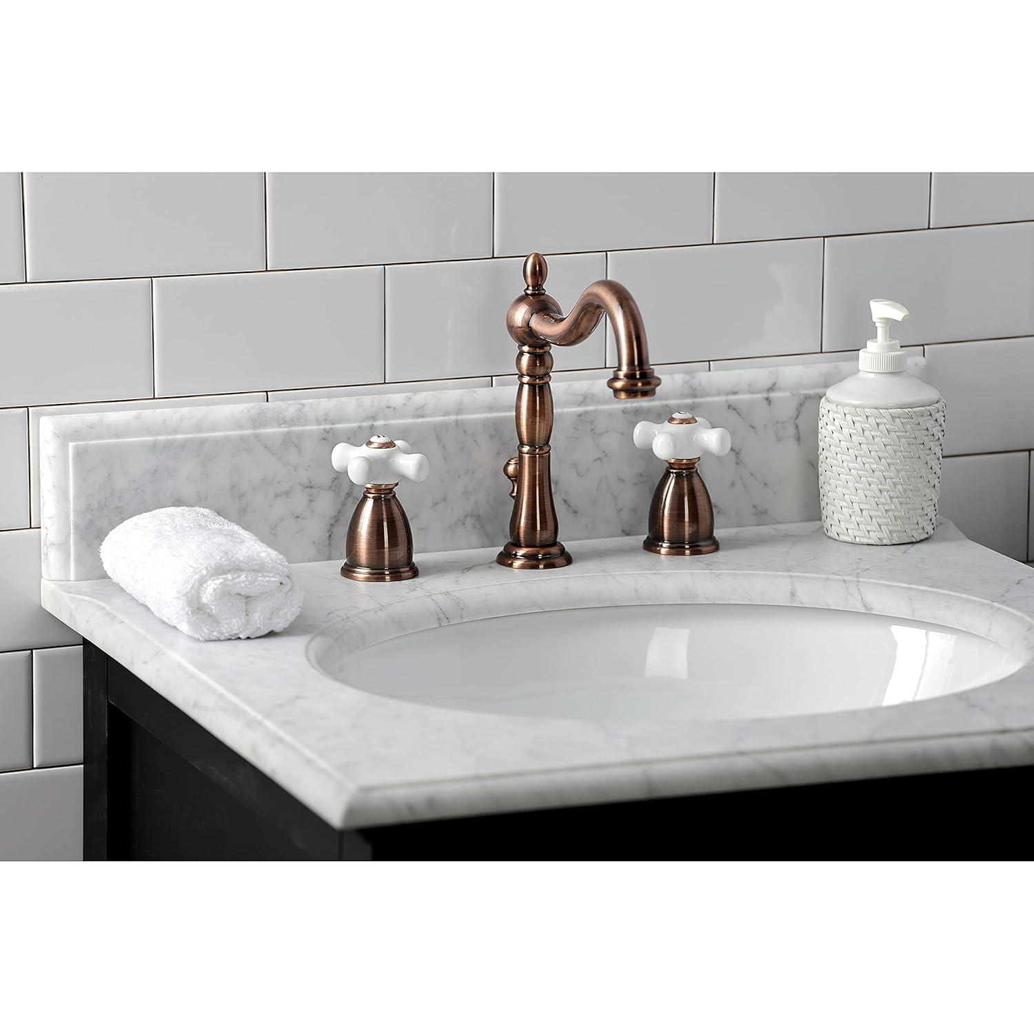 Kingston Brass Heritage Two-Handle 3-Hole Deck Mount Widespread Bathroom Faucet with Brass Pop-Up Drain