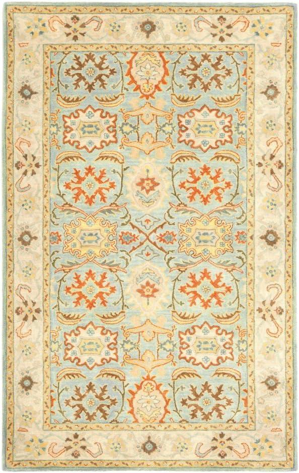 SAFAVIEH Heritage Giles Traditional Wool Area Rug, Light Blue/Ivory, 4' x 6'