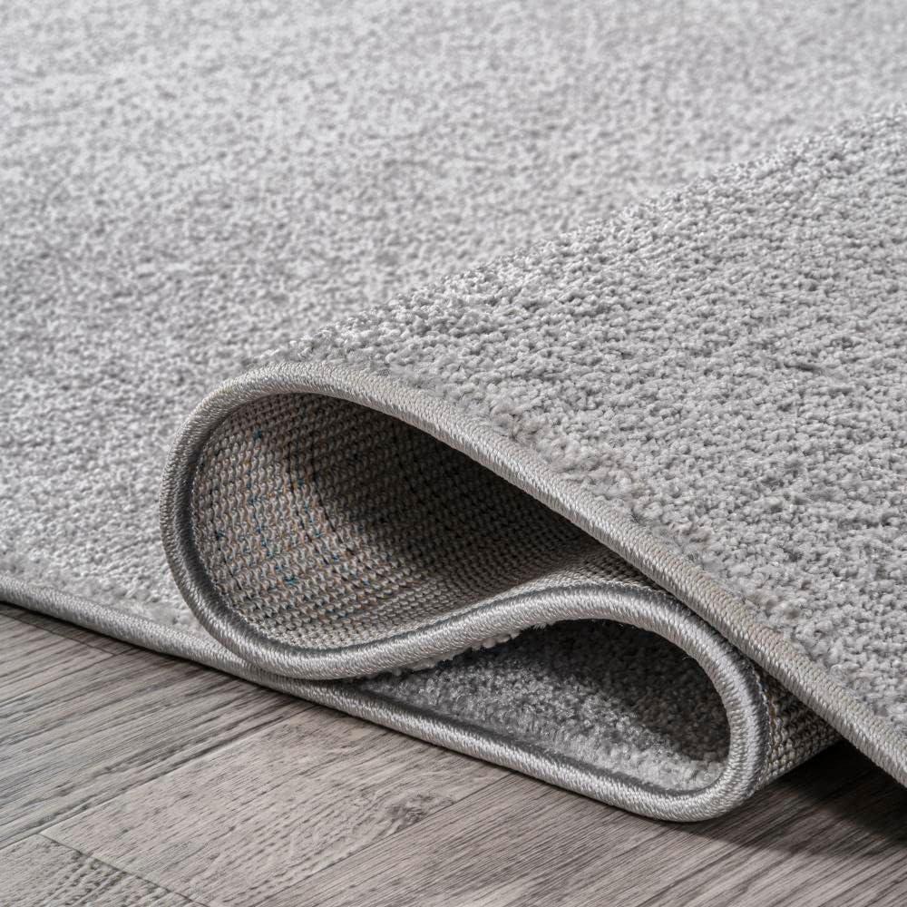 5'x8' Haze Solid Low-Pile Area Rug, Light Gray - JONATHAN Y