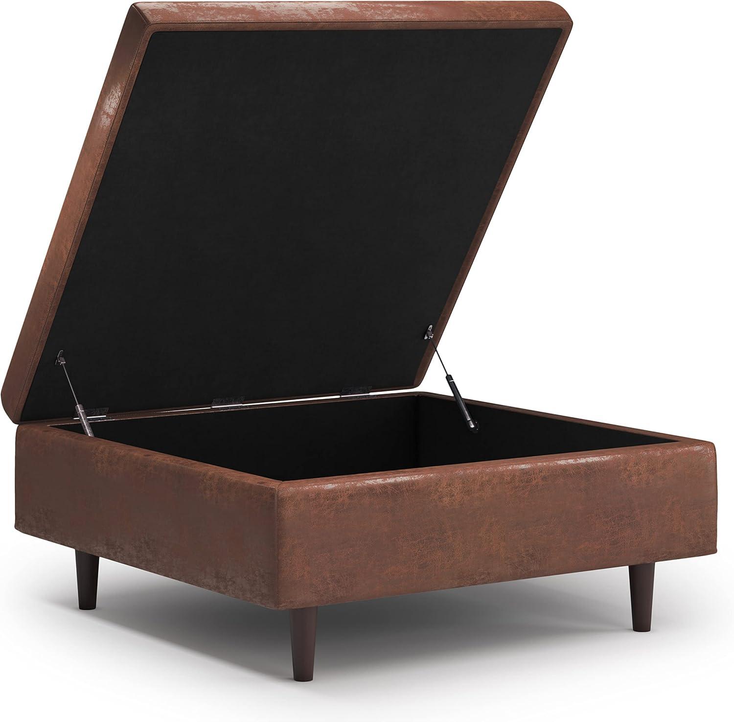 Simpli Home Shay 38 inch Wide Mid Century Modern Square Mid Century Large Square Coffee Table Storage Ottoman in Distressed Saddle Brown Vegan Faux Leather