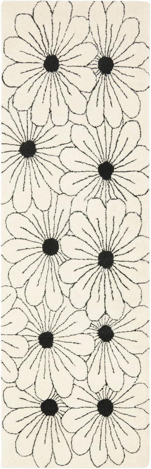 Ivory and Black Tufted Wool Floral 5' x 8' Area Rug