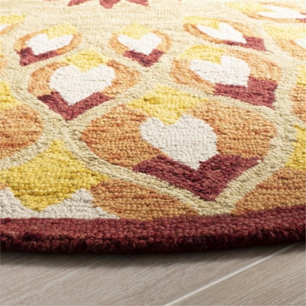Novelty NOV603 Hand Tufted Area Rug - Rust/Gold - 5' round - Safavieh.