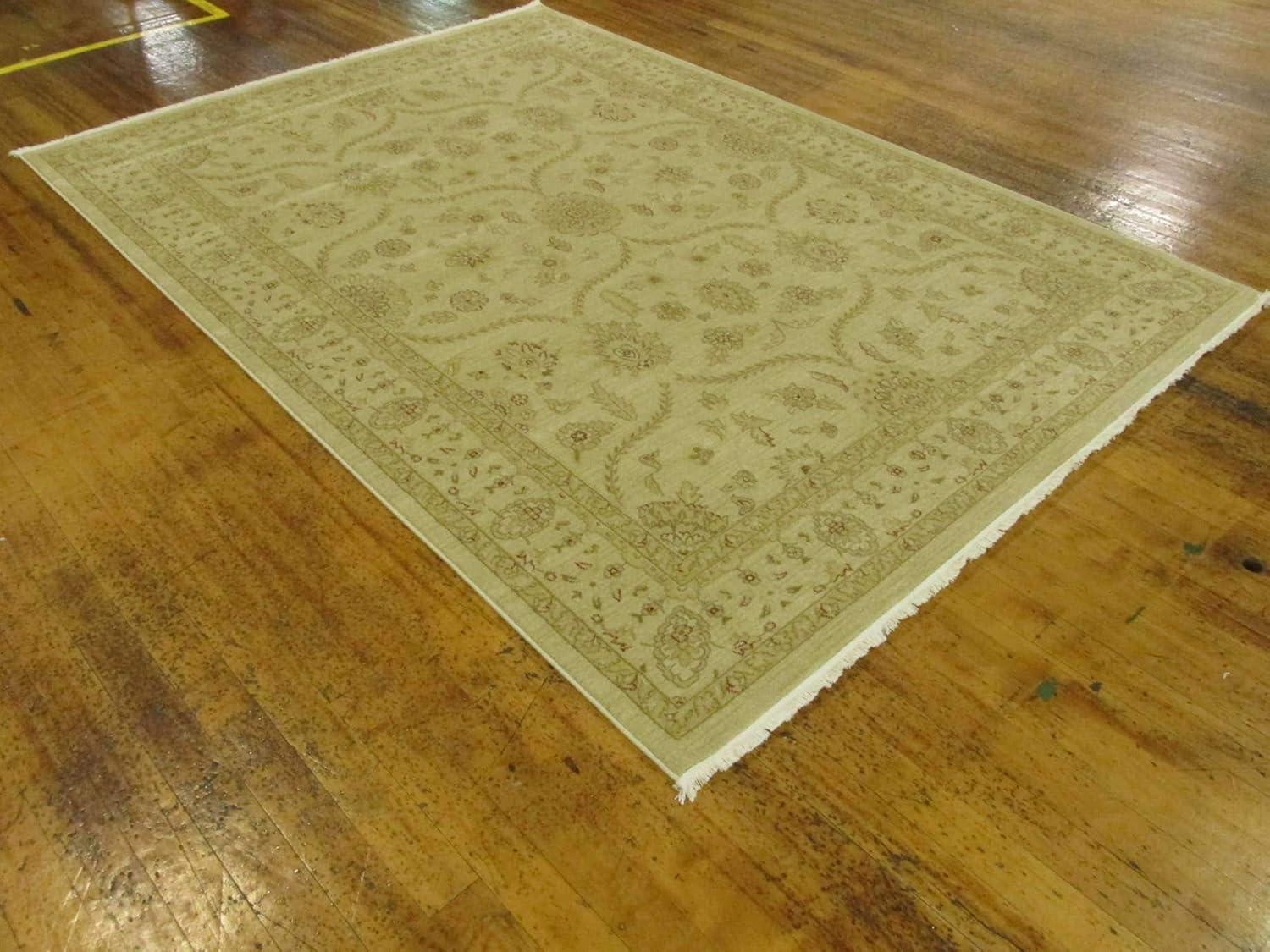 Cream and Beige 9' x 12' Synthetic Traditional Area Rug