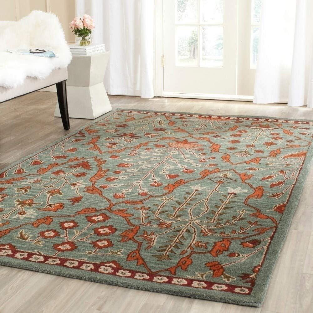 Wyndham WYD206 Hand Tufted Area Rug - Blue/Rust - 5'x8' - Safavieh.