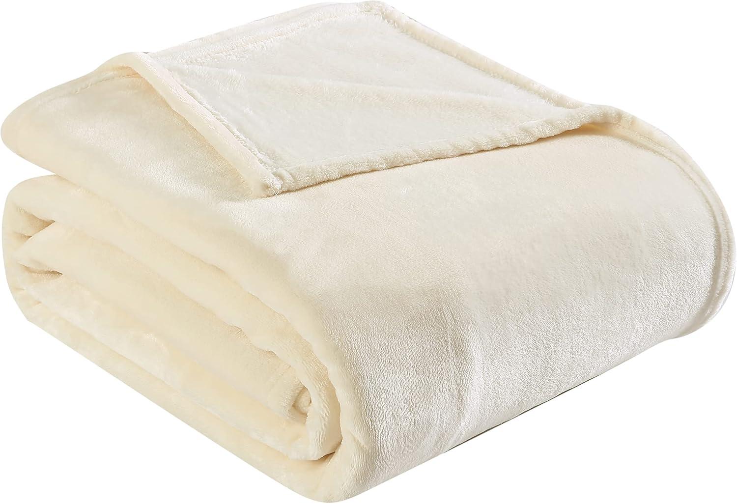 Cozy Twin-Sized Fleece Packable Blanket in Ivory