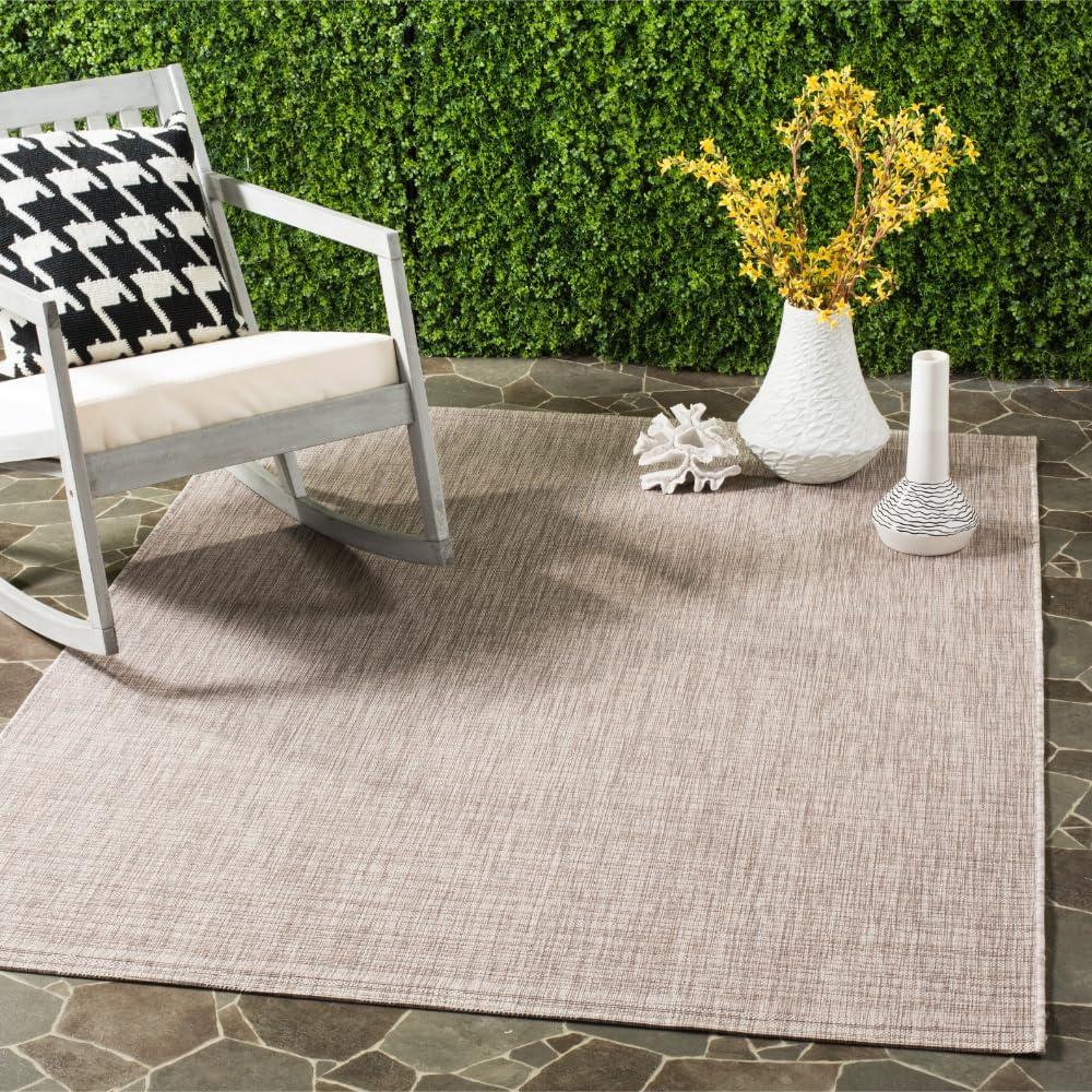 SAFAVIEH Courtyard Samson Solid Indoor/Outdoor Area Rug, 5'3" x 7'7", Light Brown