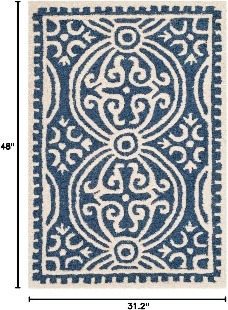 Cambridge CAM123 Hand Tufted Area Rug  - Safavieh