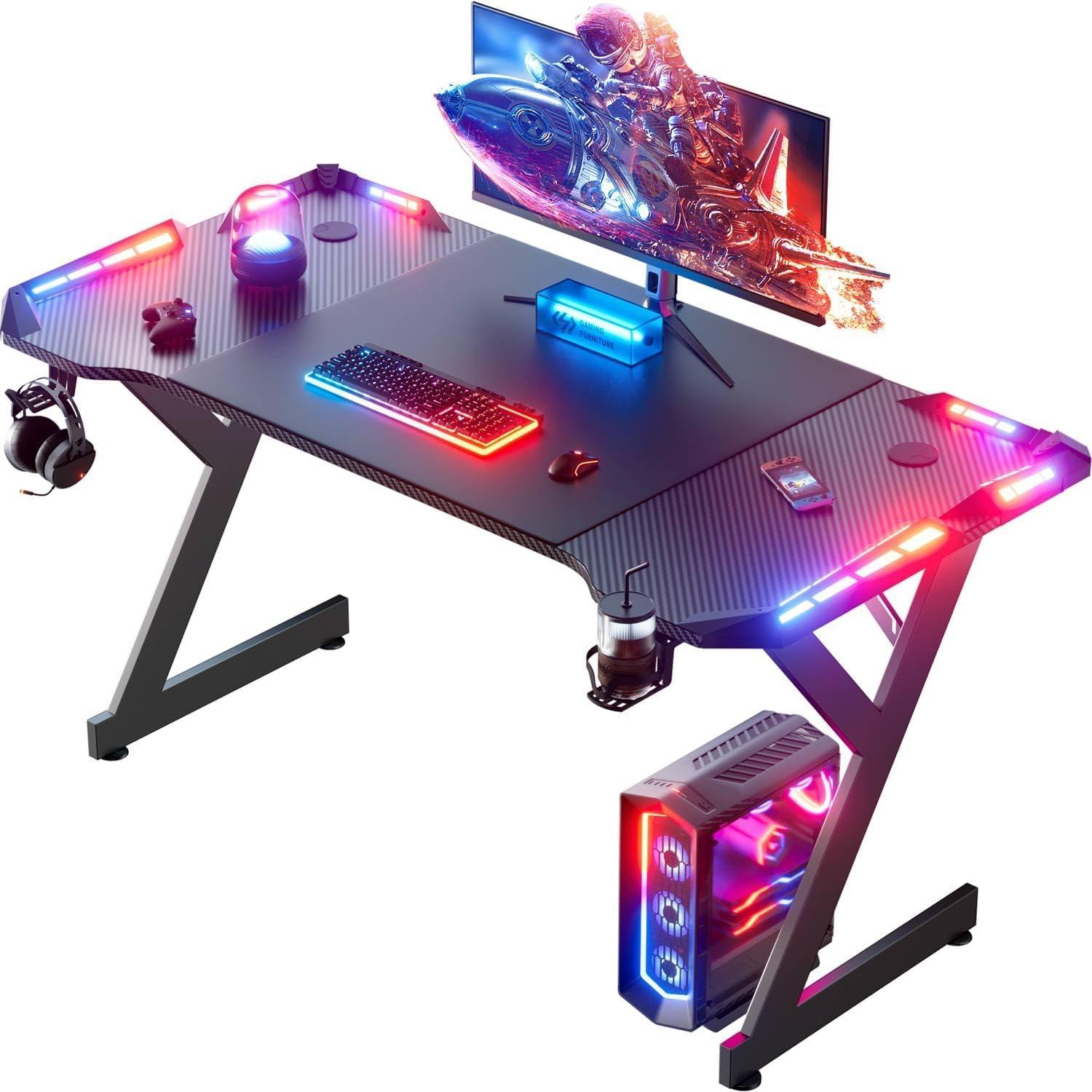 47 Inch Gaming Desk with LED Lights, Ergonomic Computer Gaming Table with Carbon Fibre Surface, Sturdy PC Workstation Desk for Home Office with Headphone Hook, Cup Holder, Black