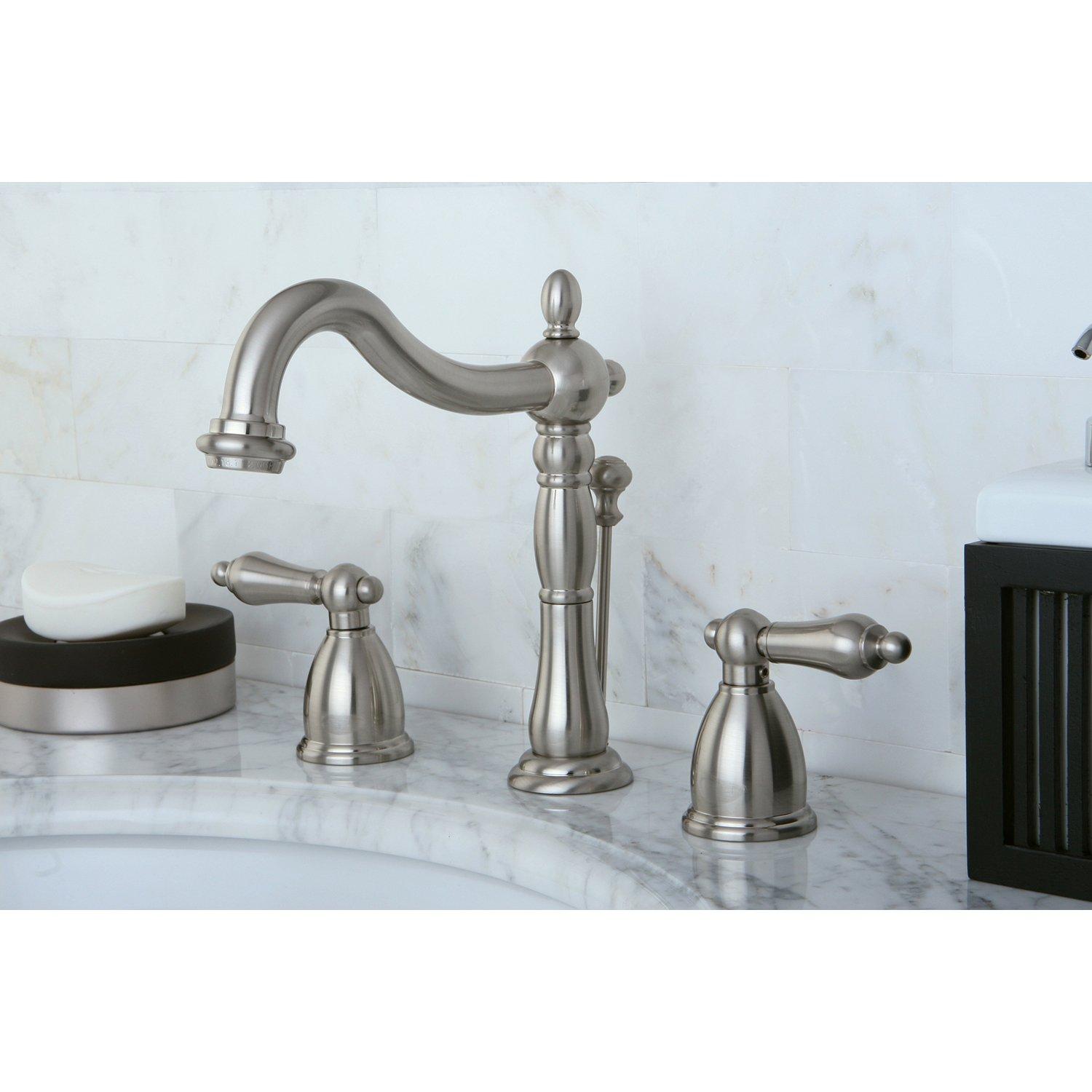 Kingston Brass Heritage Two-Handle 3-Hole Deck Mount Widespread Bathroom Faucet with Pop-Up Drain