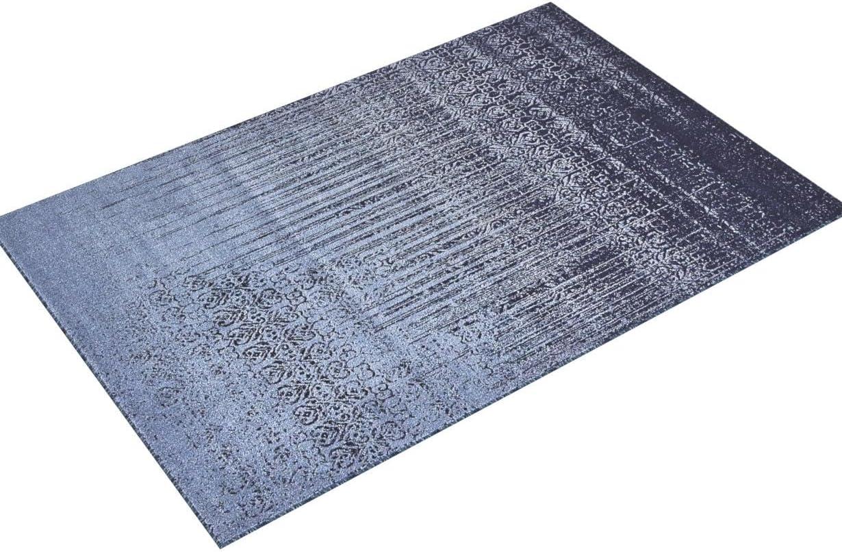 Blue Tufted Washable Reversible 6' x 9' Synthetic Rug