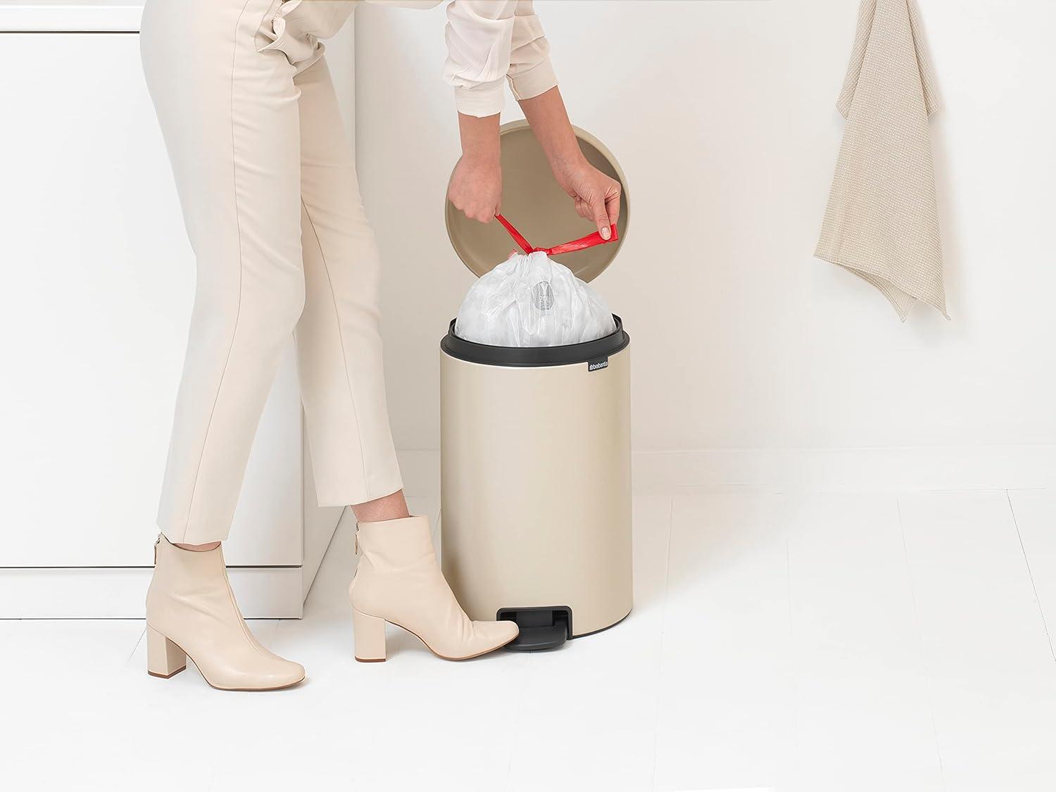 Soft Beige Round Plastic Step-On Kitchen Trash Can, 5.3 Gallons