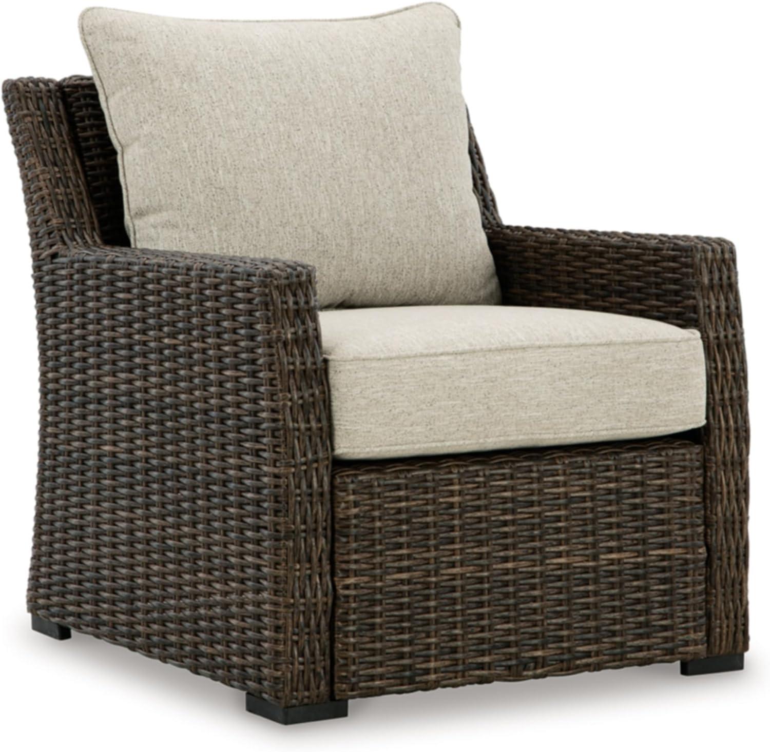 Brown Wicker Outdoor Lounge Chair with White Cushions