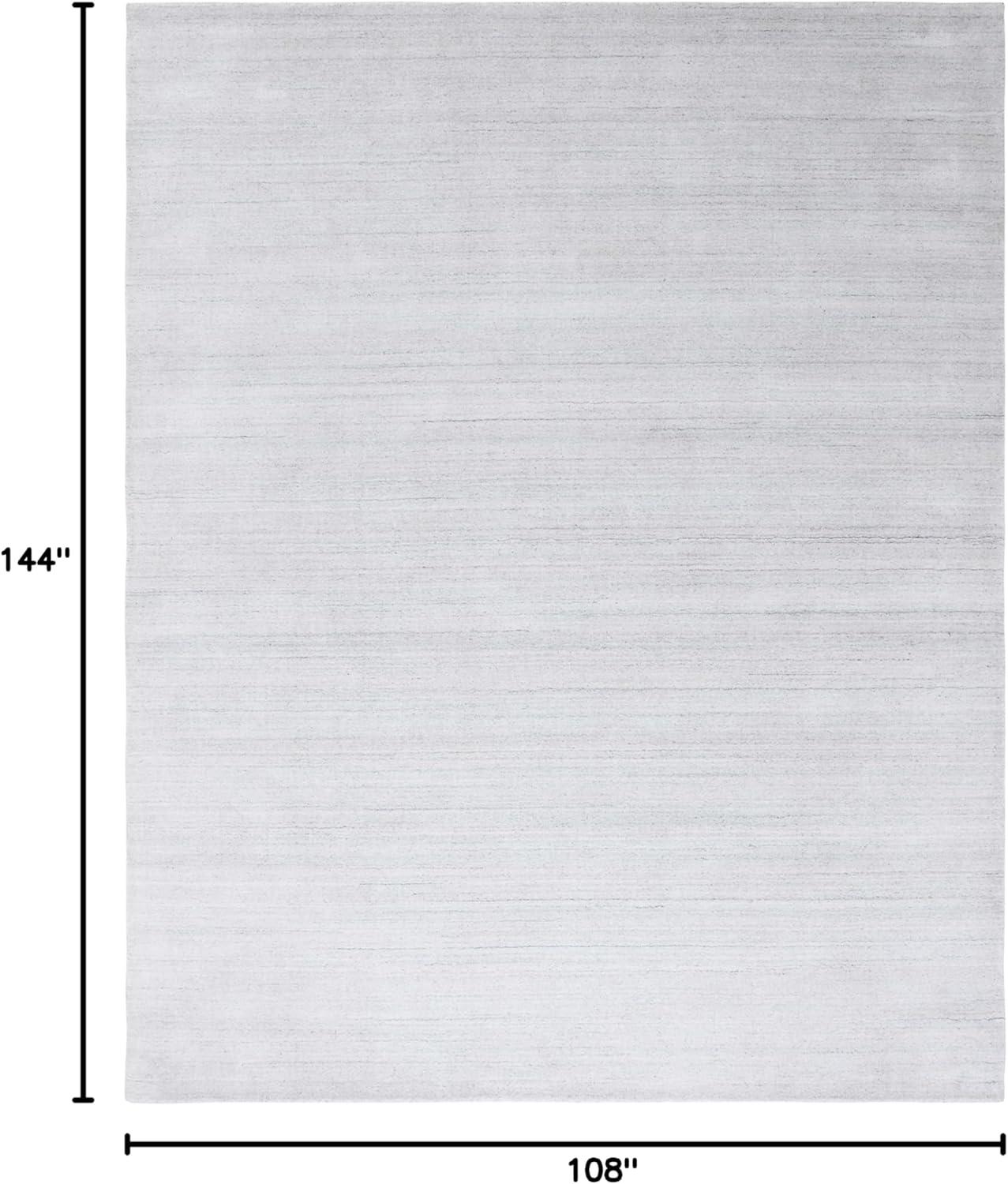 SAFAVIEH Mirage Branislav Solid Area Rug, Silver, 9' x 12'