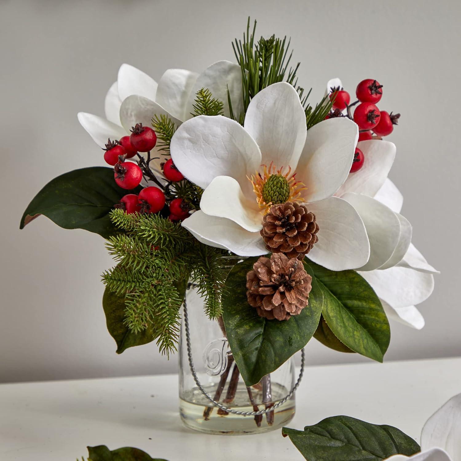 Winter Magnolia, Pine, and Berry Arrangement in Glass Vase