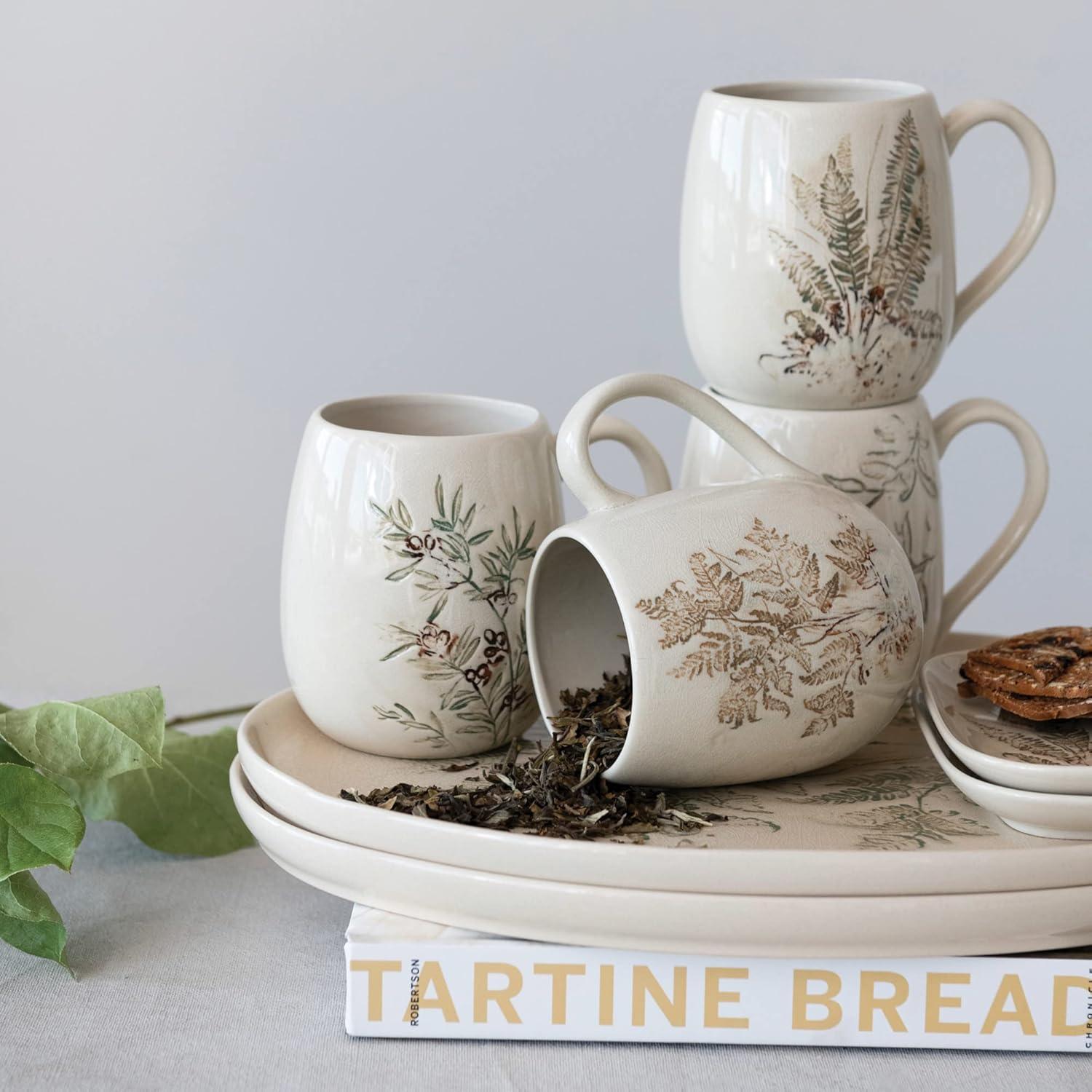 Creative Co-Op Debossed Stoneware Mug, Set of 4 Styles, Cream and Green Reactive Crackle Glaze