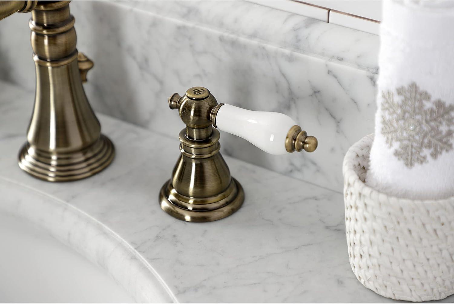 Kingston Brass American Patriot Two-Handle 3-Hole Deck Mount Widespread Bathroom Faucet with Brass Pop-Up Drain