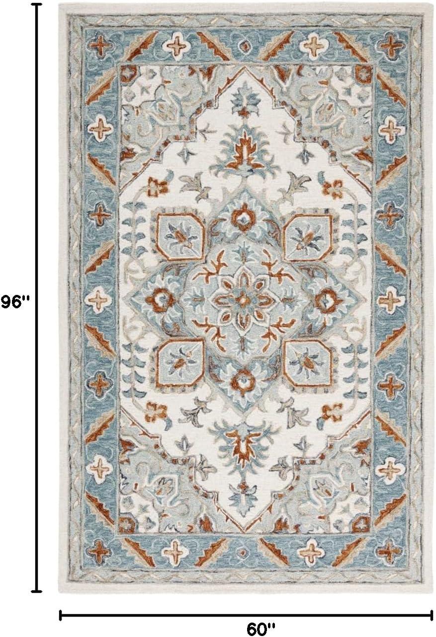 Metro MET352 Hand Tufted Indoor Area Rug - Ivory/Blue - 5'x8' - Safavieh
