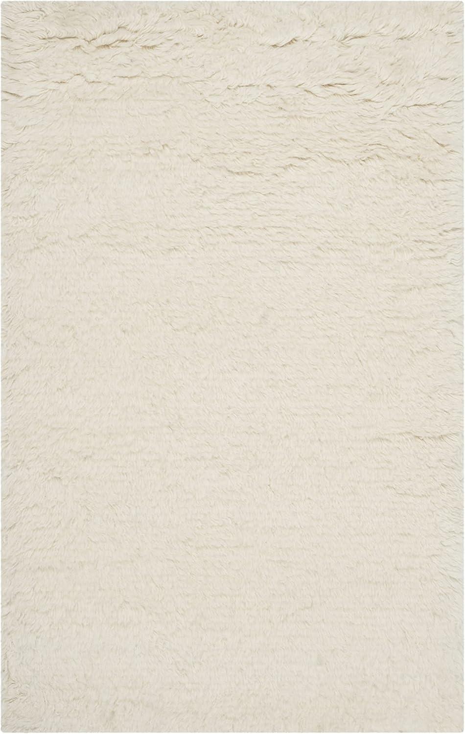 SAFAVIEH Flokati Gisselle Solid Wool Area Rug, Ivory, 2'6" x 4'