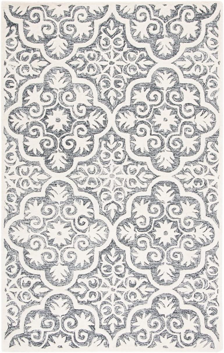 Metro MET859 Hand Tufted Indoor Area Rug - Black/Ivory - 8'x10' - Safavieh