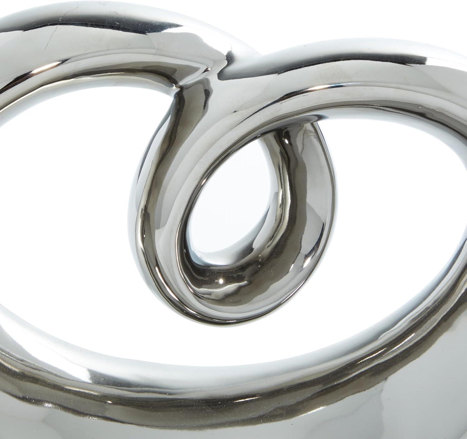 Wrought Studio™ Allye Ceramic Swirl Abstract Decorative Silver Sculpture with Black Base