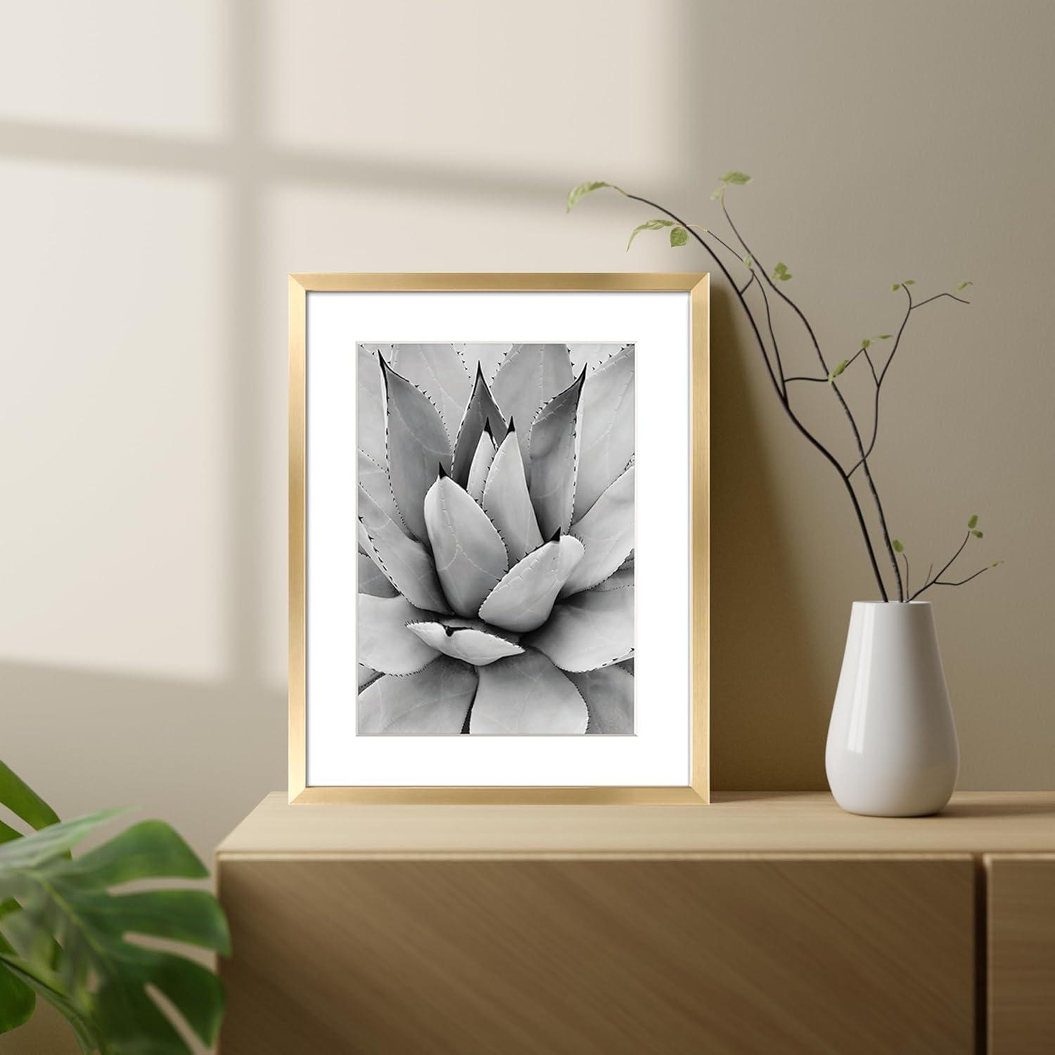 ArtbyHannah 7 Pack Gold Gallery Wall Picture Frames Sets with Decorative Botanical Art Prints for Photo Frame Collages for Home Decoration, Multiple Sizes 11x14x1, 8x10x2, 5x7x4