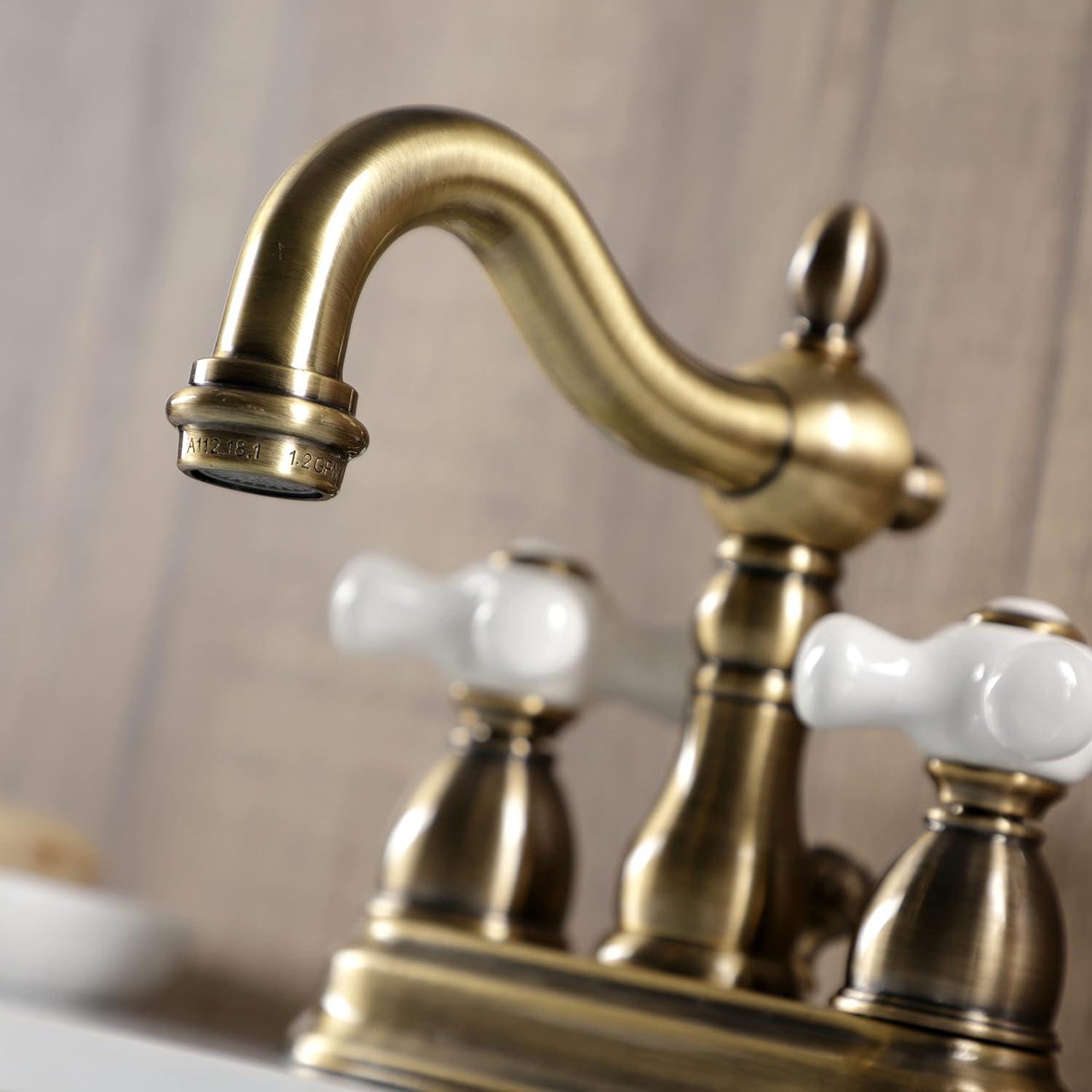 Kingston Brass Heritage Two-Handle 3-Hole Deck Mount 4" Centerset Bathroom Faucet with Plastic Pop-Up
