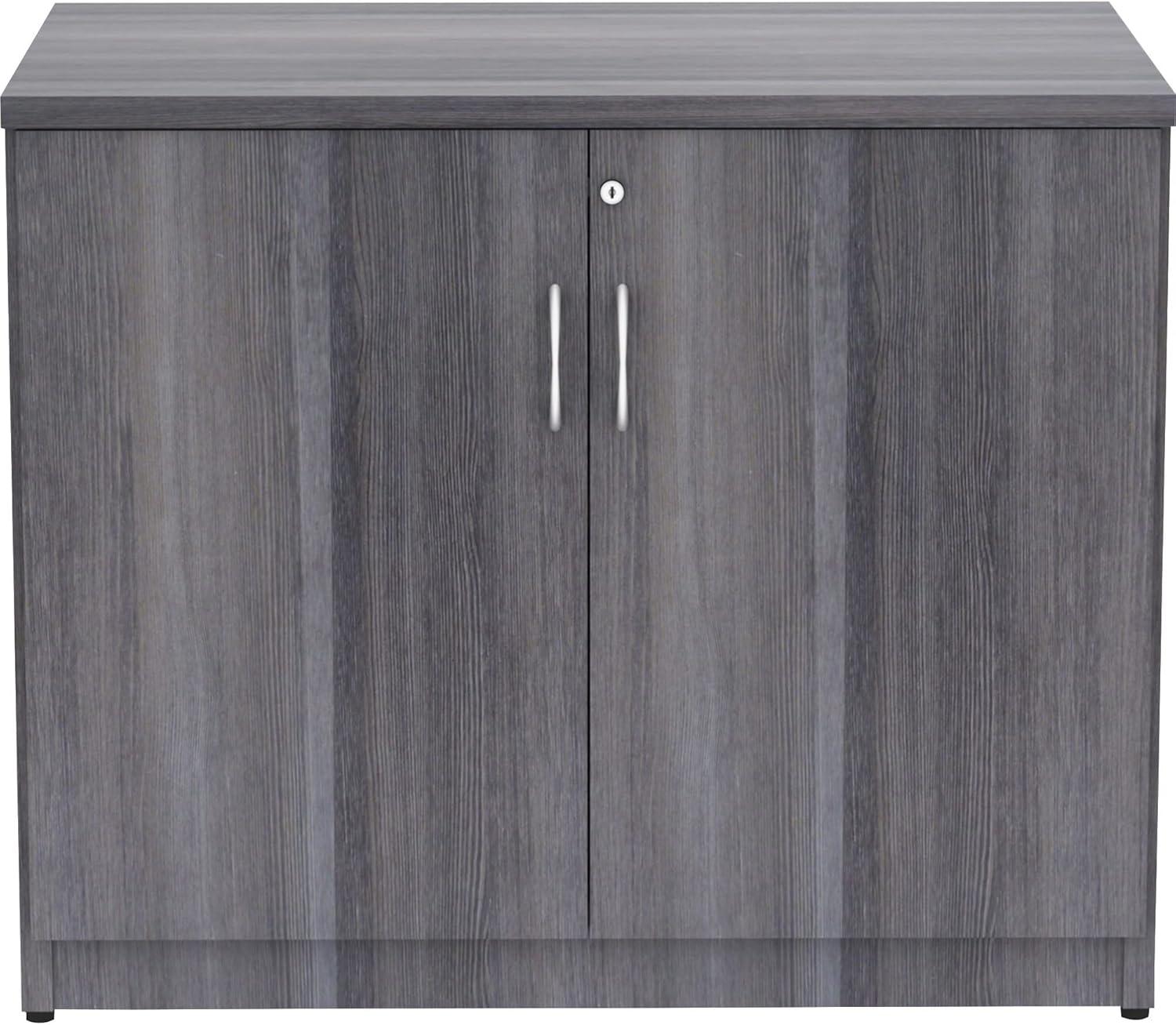 Essentials Series 2-Door Storage Cabinet - 36" X 22.5" X 29.5" - Drawer(S)2 Door(S) - Material: Melamine Faced Chipboard (MFC) Top, Melamine Faced Chipboard (MFC) Shelf, Melamine Faced Chipboard (MFC) Side Panel, Melamine Panel - Finish: Weathered Charcoa