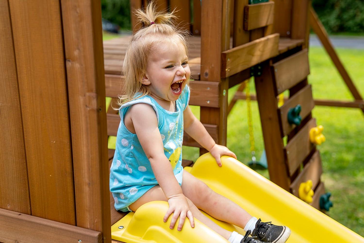 Swing-N-Slide Castlebrook Wooden Backyard Swing Set with Wave Slide, Curved Slide, Climbing Wall, and Swings