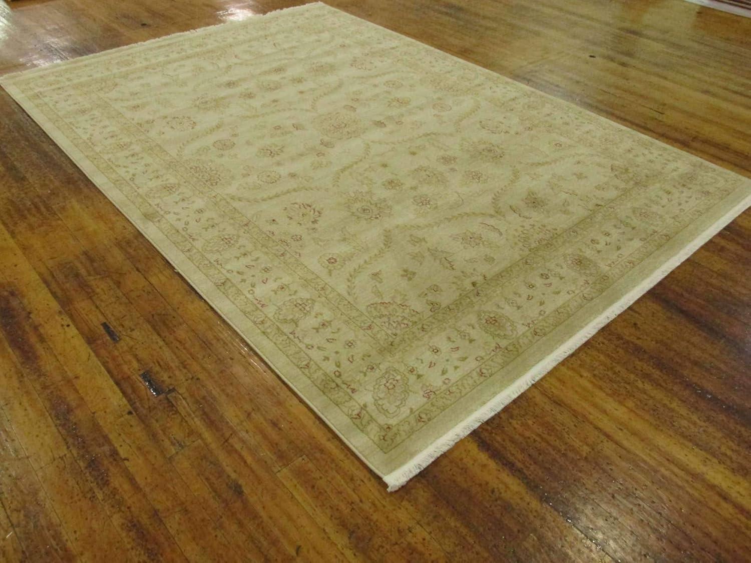 Cream and Beige 9' x 12' Synthetic Traditional Area Rug