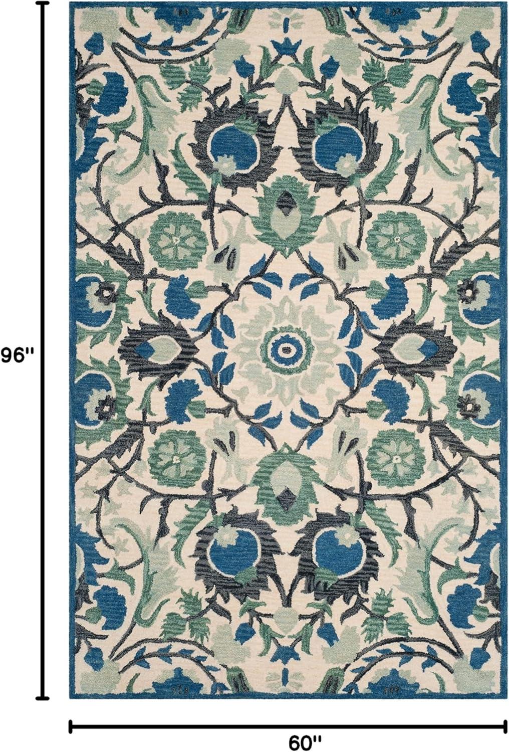 Antiquity AT59 Hand Tufted Area Rug - Ivory/Blue - 5'x8' - Safavieh.