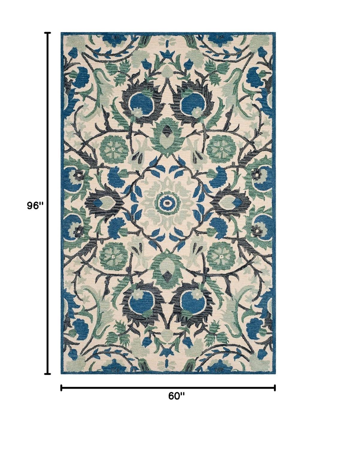 Antiquity AT59 Hand Tufted Area Rug - Ivory/Blue - 5'x8' - Safavieh.