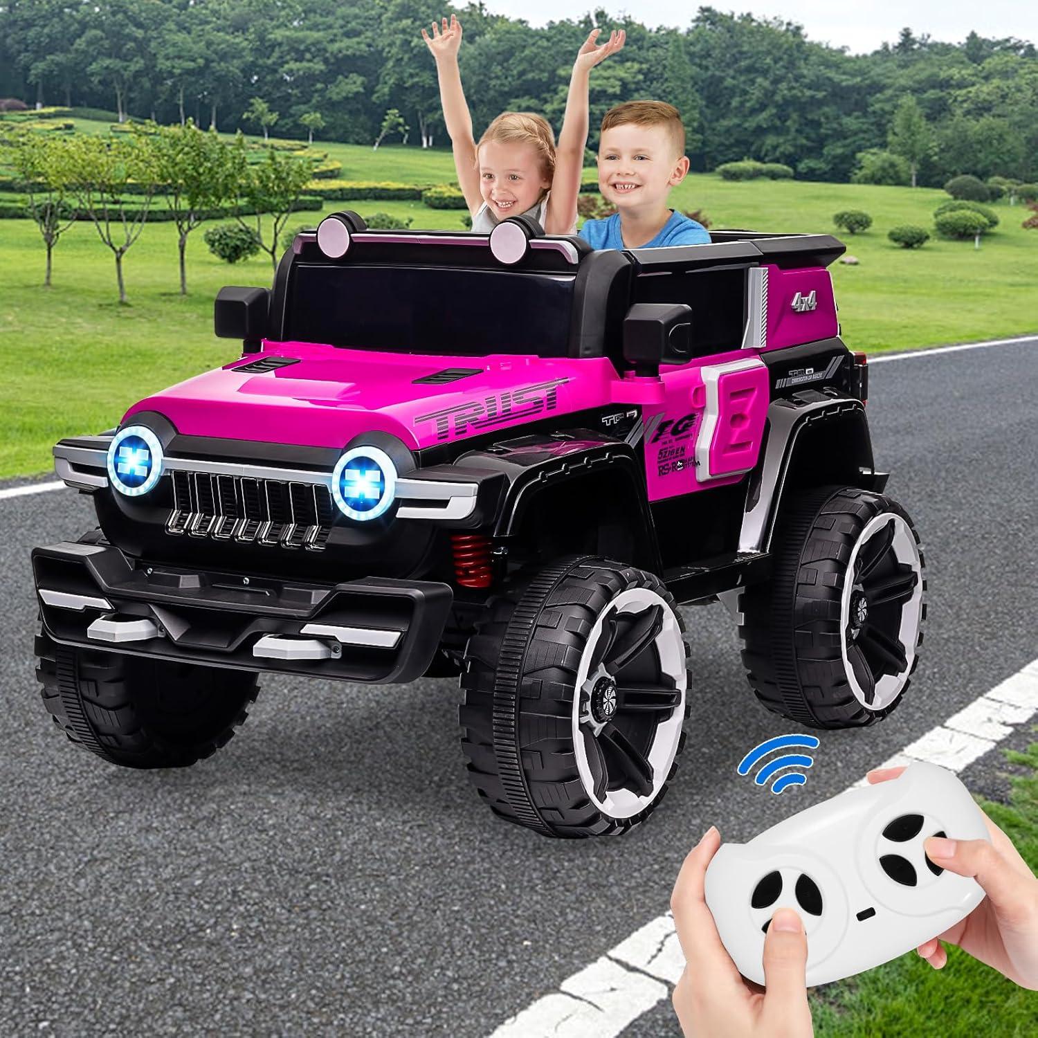 Tuekys 2 Seater Kids Ride On Truck, 12V Battery Powered Electric Vehicle with Spring Suspensions, Remote Control, Decorative Spare Tire, USB, Music, Pink