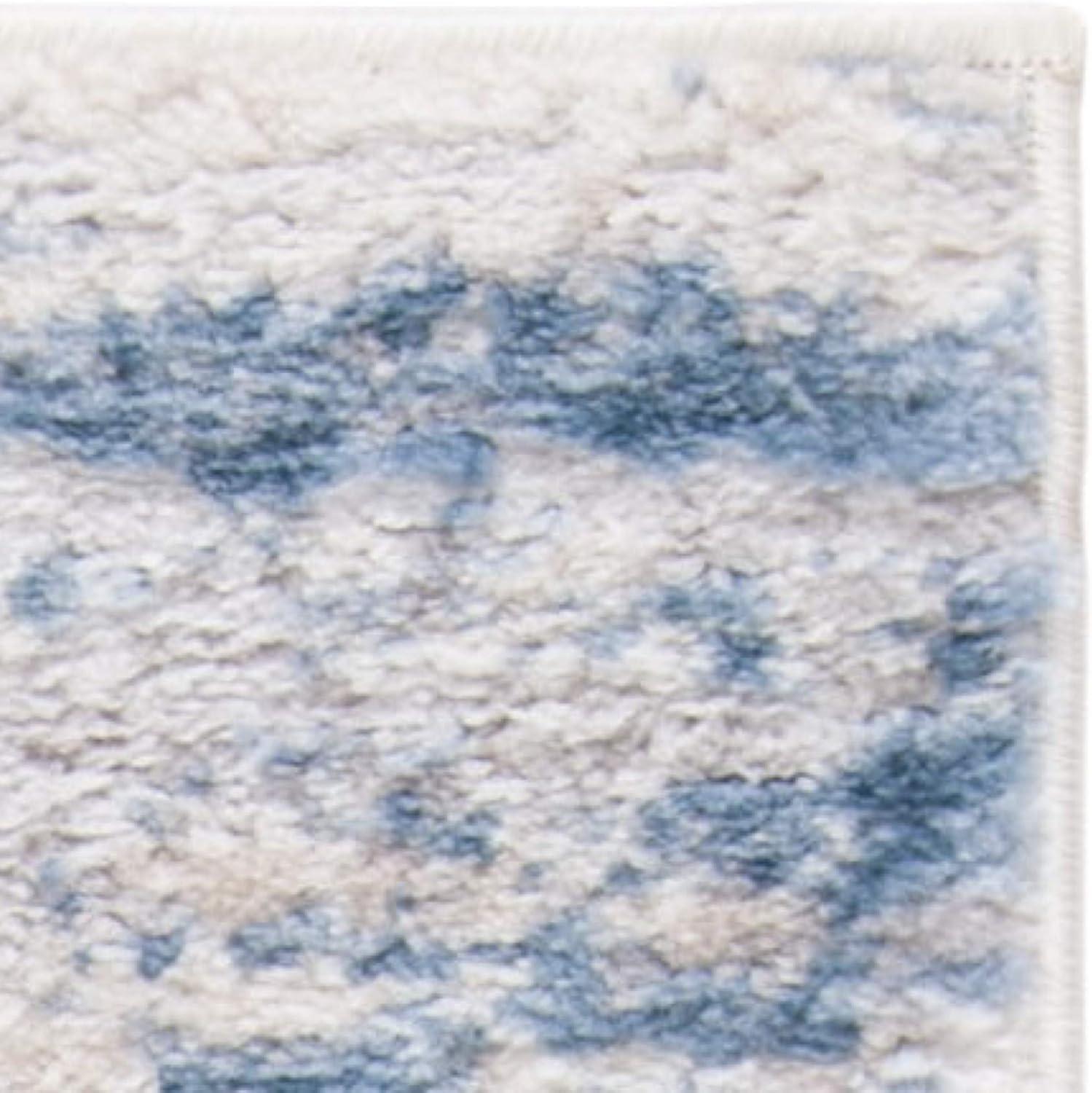 Ivory and Blue Abstract Distressed 2'2" x 4' Area Rug