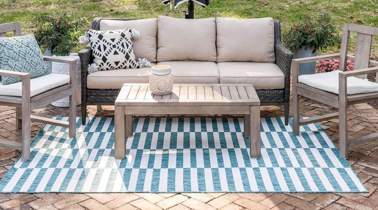 Teal and Ivory Stripe Easy-Care Outdoor Rug 5'1" x 8' Rectangular Synthetic