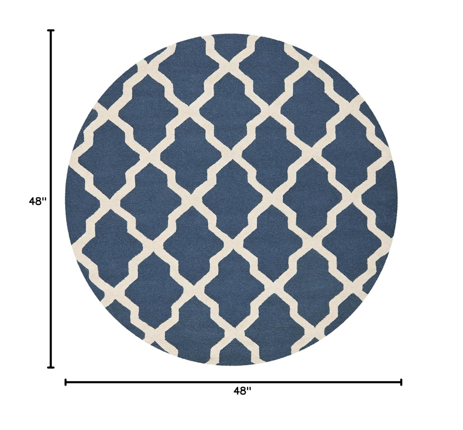 SAFAVIEH Cambridge Liam Geometric Wool Area Rug, Navy Blue/Ivory, 4' x 4' Round