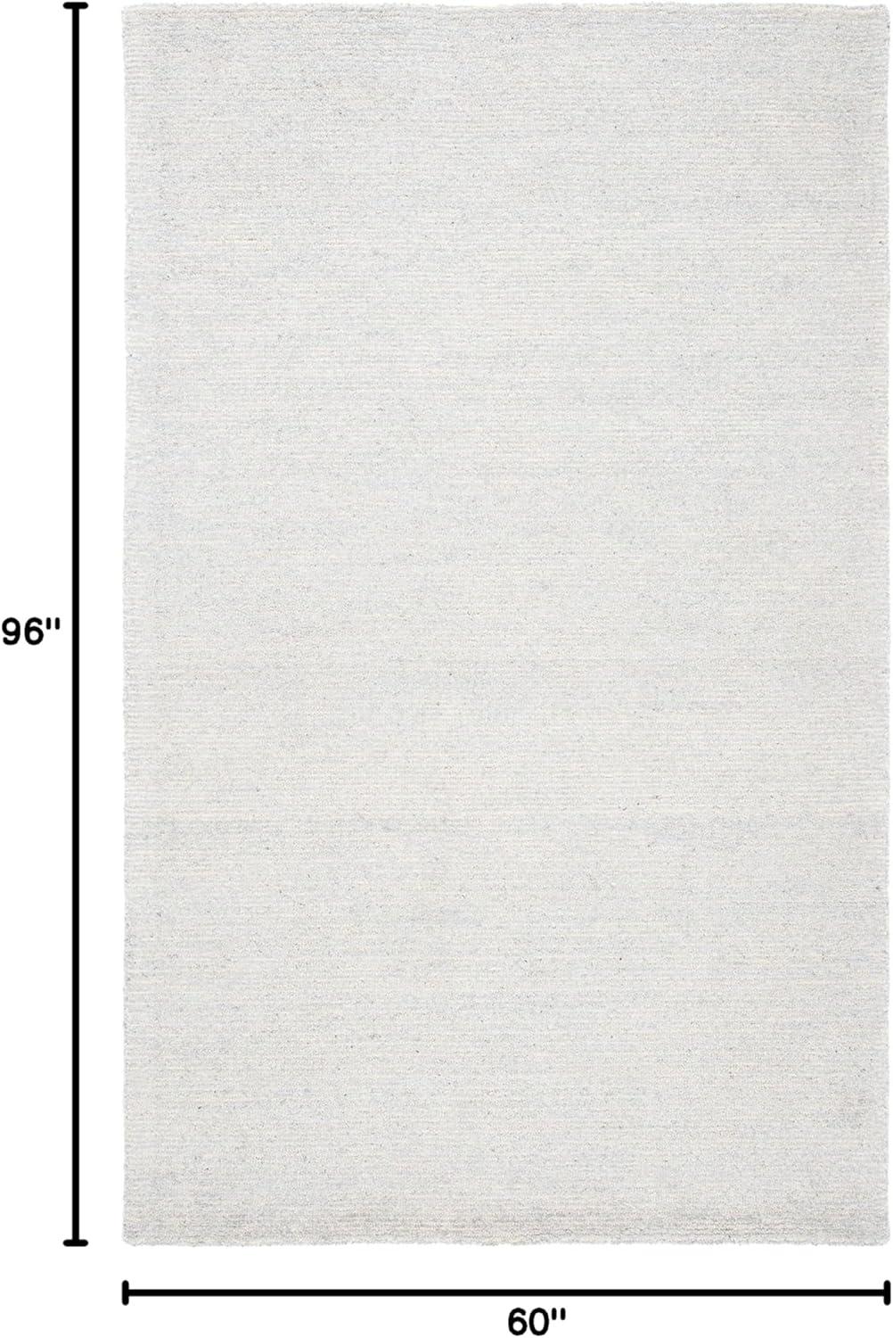Himalaya HIM153 Hand Tufted Area Rug - Blue - 5'x8' - Safavieh.