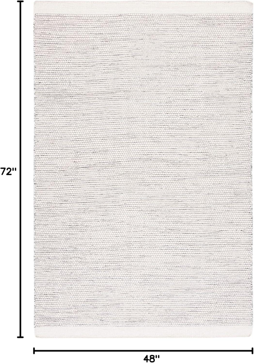 Ivory and Black Flat Woven Wool Area Rug, 4' x 6'