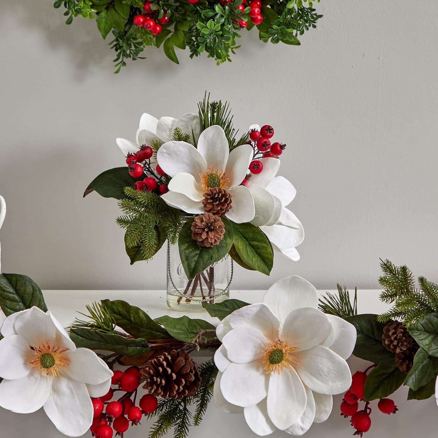 Winter Magnolia, Pine, and Berry Arrangement in Glass Vase