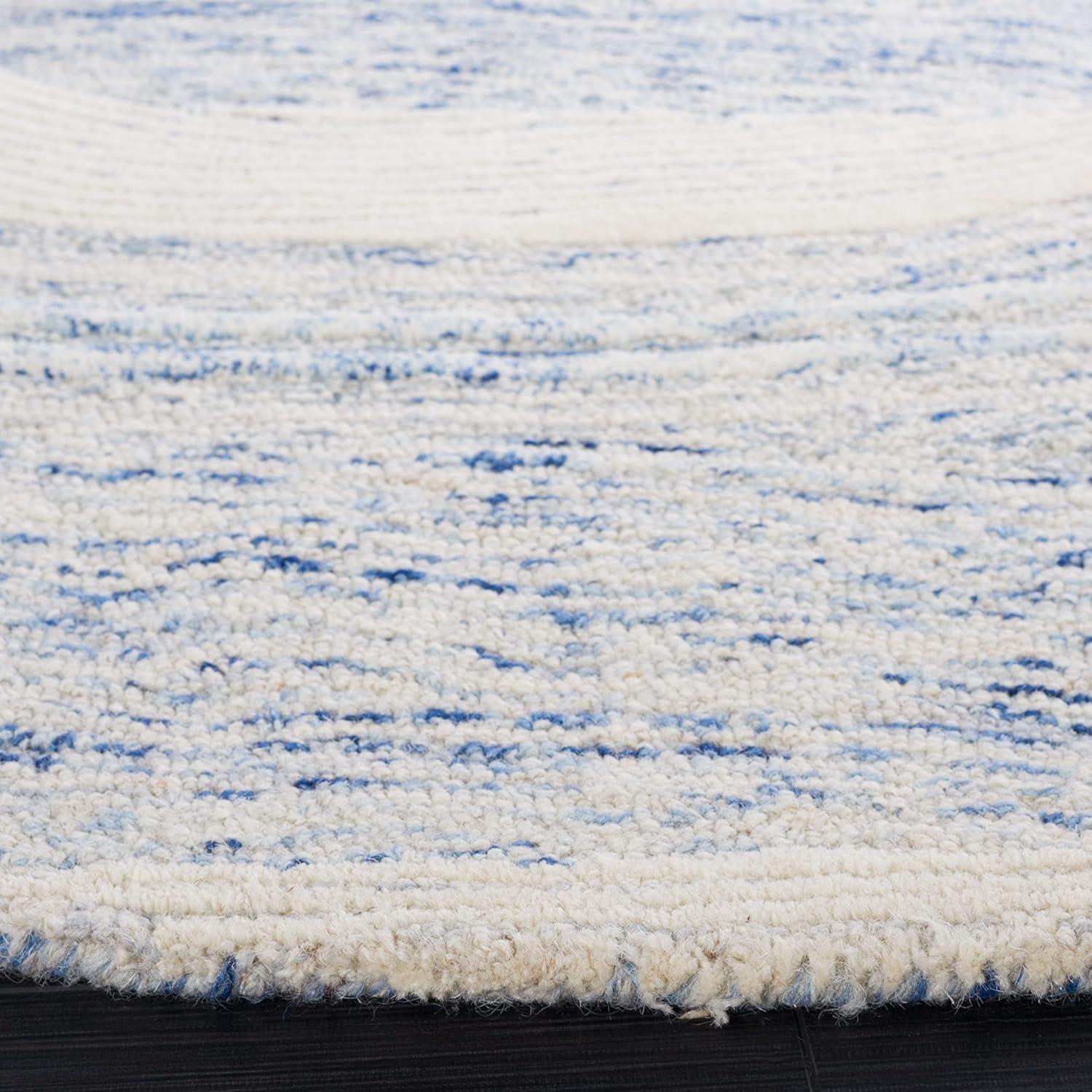 Round Blue and Ivory Tufted Wool Area Rug