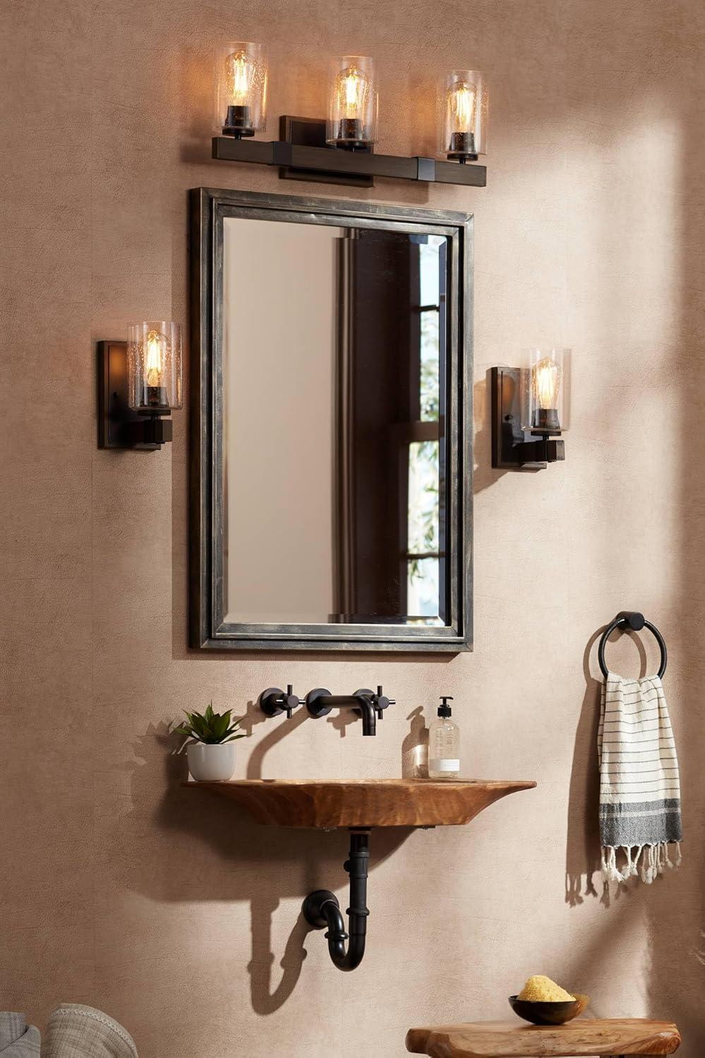 Bronze and Wood Grain Industrial Wall Sconce with Seedy Glass Shade