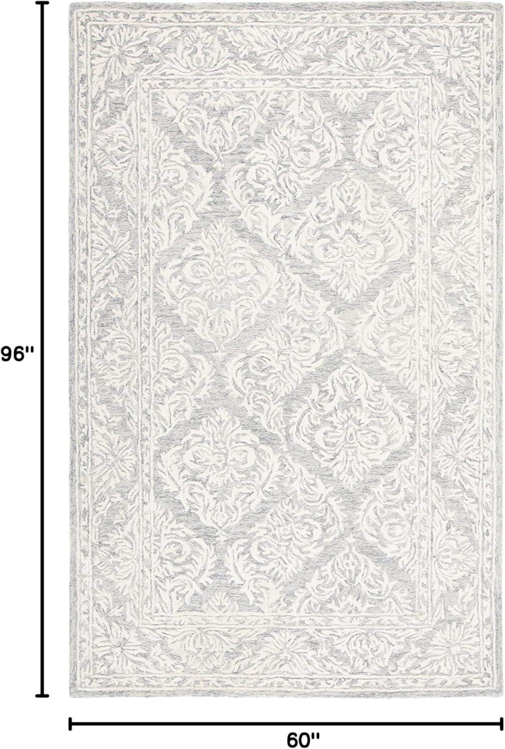 Metro MET865 Hand Tufted Indoor Area Rug - Dark Grey/Ivory - 5'x8' - Safavieh