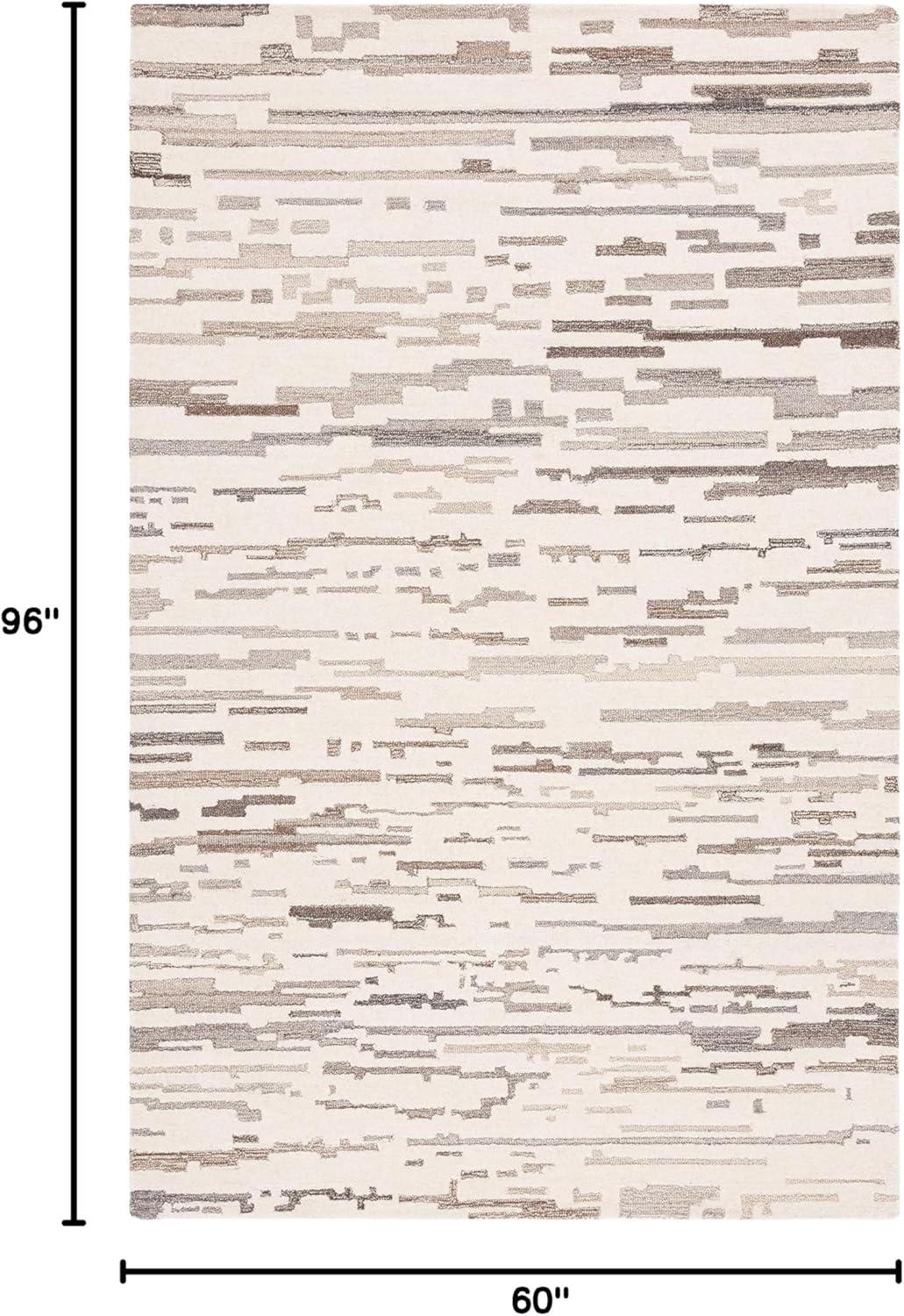 Ebony EBN501 Hand Tufted Area Rug - Ivory/Grey - 5'x8' - Safavieh.