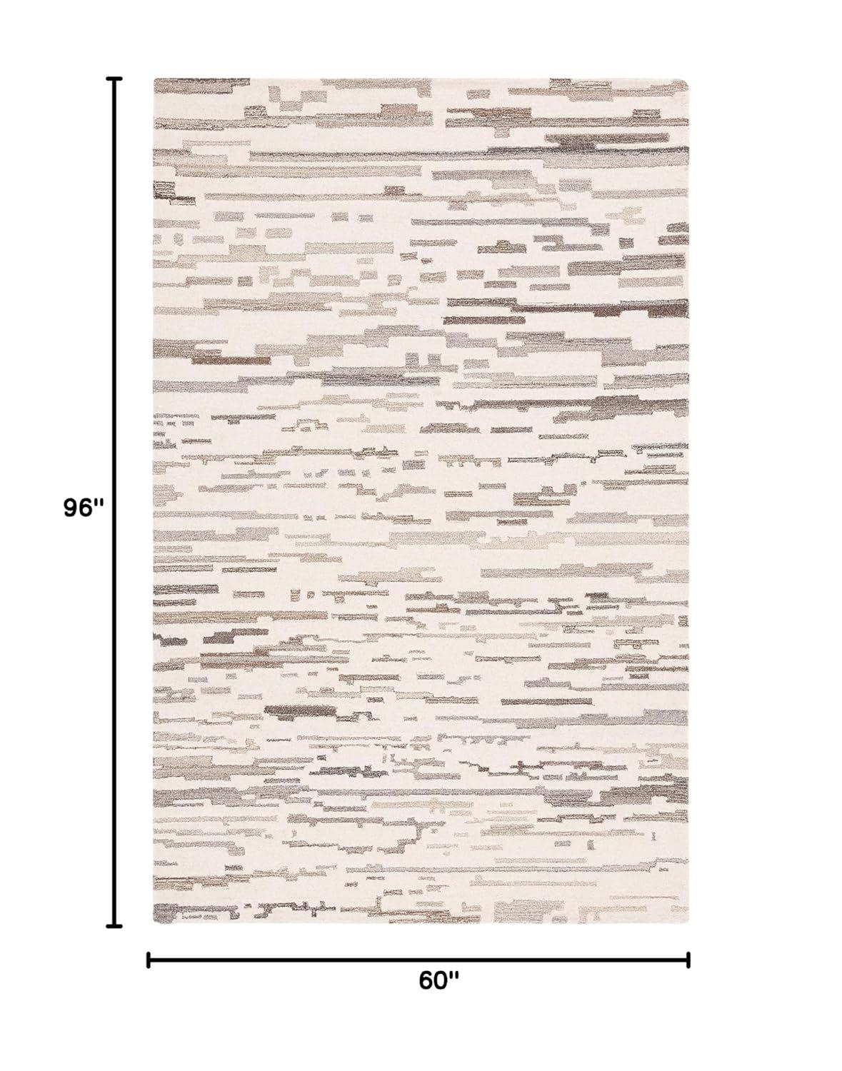 Ebony EBN501 Hand Tufted Area Rug - Ivory/Grey - 5'x8' - Safavieh.