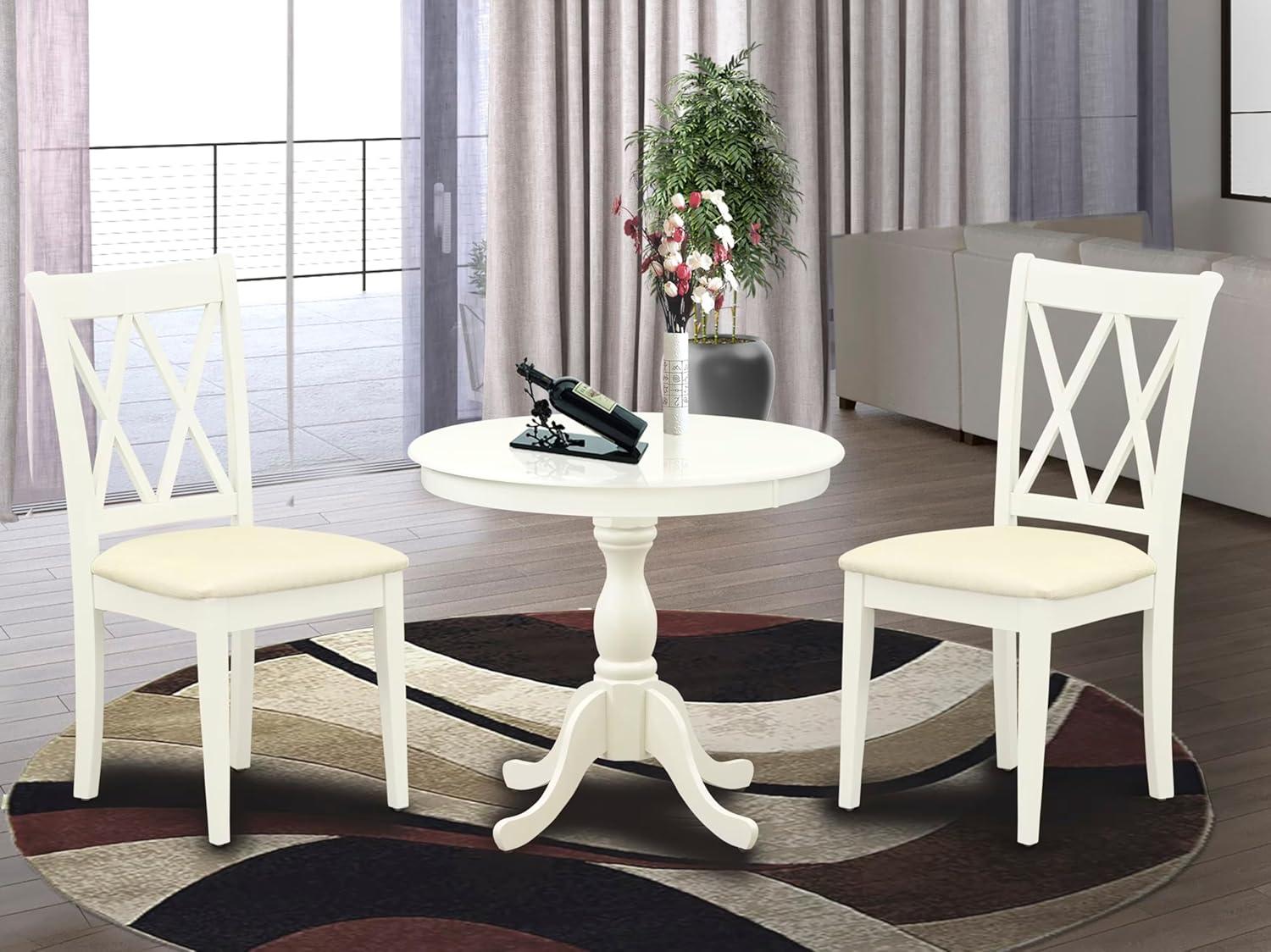 Linen White Round Pedestal Table with Double X-Back Chairs