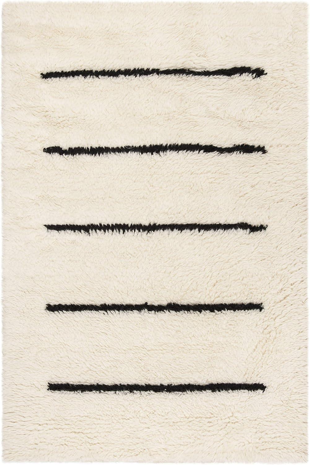 Elevated Tribal Essence Black Wool 3' x 5' Hand-Knotted Rug