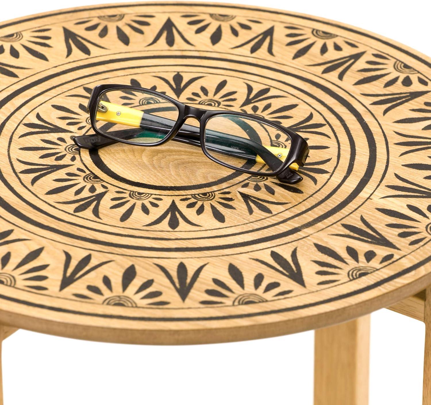 Natural Wood and Metal Round Coffee Table with Floral Design